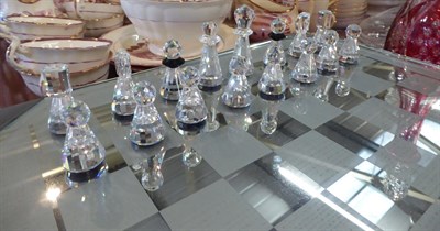 Lot 210 - A silver crystal Swarovski chess set, boxed