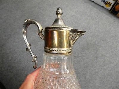 Lot 223 - A Victorian silver mounted glass decanter and stopper, Birmingham, together with a plated and glass