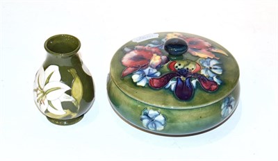 Lot 238 - A Moorcroft pottery Orchid pattern jar and cover, 15cm diameter, together with a Hibiscus...