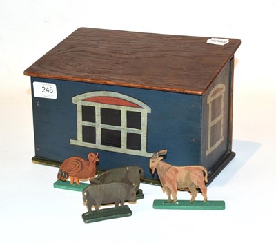 Lot 248 - A painted wooden Noah's Ark including animals and figures