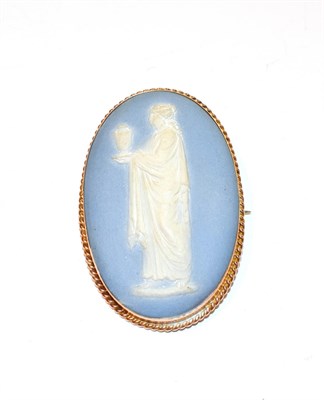 Lot 257 - A Wedgwood brooch, within a beaded gilt metal frame, measures 6.5cm by 4.2cm