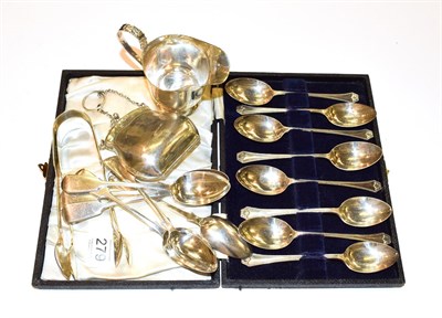 Lot 279 - Two pairs of Victorian silver sugar nips, silver cream jug, set of six silver teaspoons, set of...