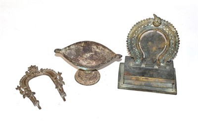 Lot 329 - An Indian brass shrine, a cast metal pedestal bowl and a brass shrine (3)