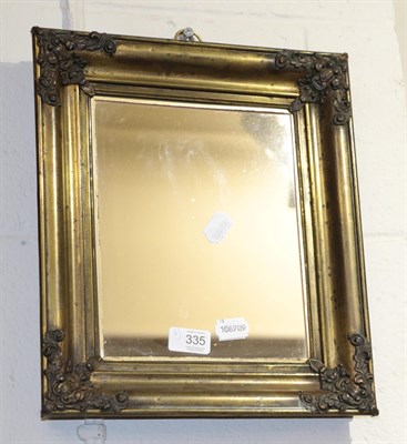 Lot 335 - A Rococco style gilt brass mirror; together with a gilt gesso mirror and a pair of tarnished...