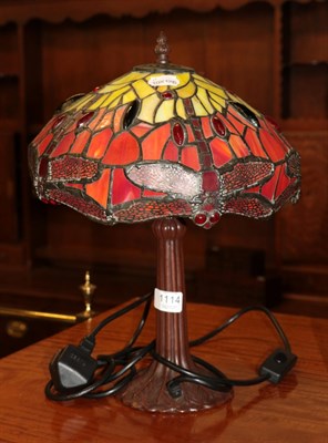 Lot 1114 - A Tiffany style table lamp decorated with dragonflies