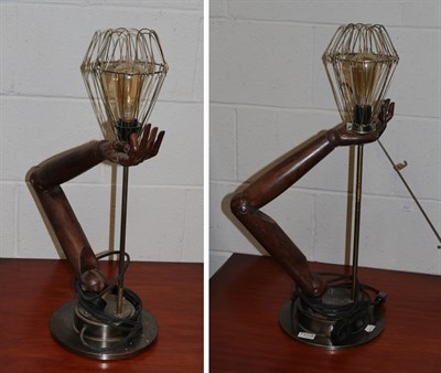 Lot 1118 - A pair of wooden arm form table lamps