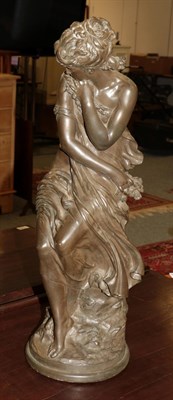 Lot 1124 - A reproduction bronze effect resin model of Diana after Moreau