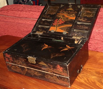 Lot 1127 - An Oriental chinoiserie lacquered travelling writing slope