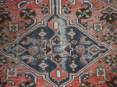 Lot 1131 - A North West Persian runner, the indigo field of Boteh enclosed by narrow ivory borders, 437cm...