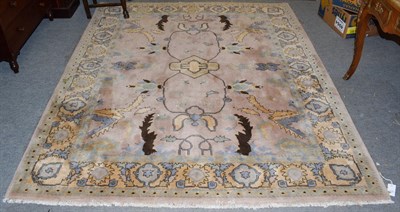 Lot 1136 - Oriental carpet, the field of angular leaves enclosed by palmette borders, 242cm by 200cm
