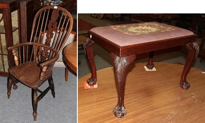 Lot 1185 - An elm Windsor chair and a mahogany footstool (2)