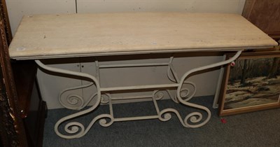 Lot 1191 - A console table with painted scroll cast wrought iron base and reconstituted marble top, 150cm...