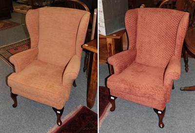 Lot 1200 - Two mahogany framed wing-back armchairs