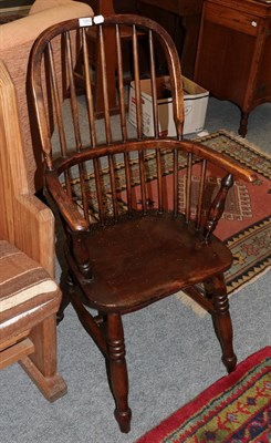 Lot 1203 - A 19th century elm Windsor chair