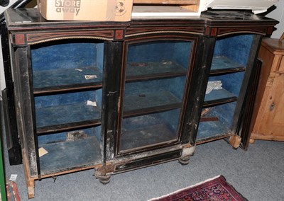 Lot 1214 - A mid-19th century inverted breakfront ebonised inlaid and gilt metal mounted display cabinet...