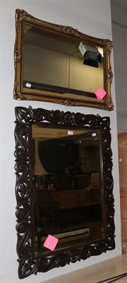 Lot 1217 - A mirror with carved and pierced frame, 103cm by 76cm; together with a reproduction gilt framed...
