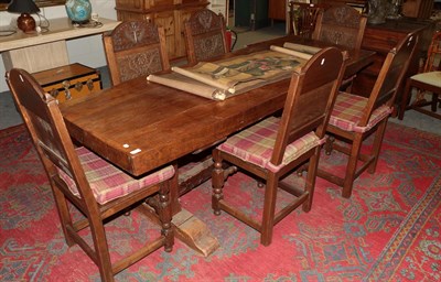 Lot 1224 - A set of six carved oak chairs