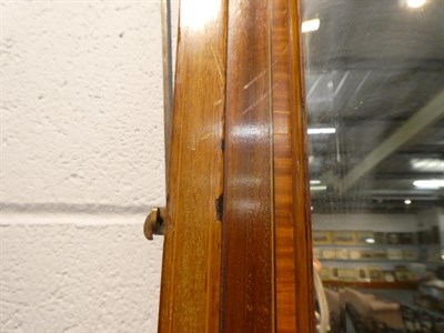 Lot 1232 - An inlaid mahogany sectional over mantel mirror, 74cm by 131cm
