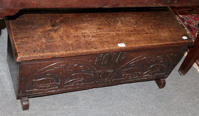 Lot 1236 - An early 18th century carved oak kist, dated 1709