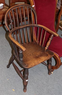 Lot 1247 - A 19th century elm Windsor armchair