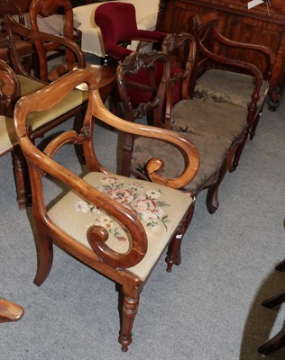 Lot 1249 - A 19th century mahogany carver; a pair of Victorian balloon-back dining chairs; and another...