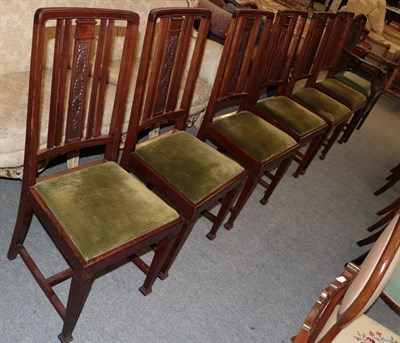 Lot 1257 - A set of six mahogany dining chairs; together with a 19th century mahogany carver (7)