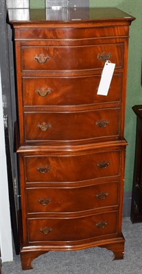 Lot 1263 - A reproduction serpentine fronted tallboy, 54cm by 40cm by 128cm high