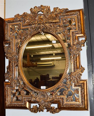 Lot 1265 - A reproduction gilt framed mirror