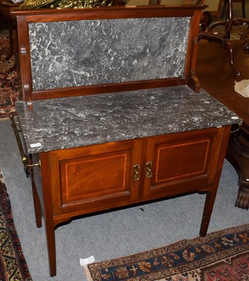 Lot 1281 - An Edwardian inlaid mahogany marble-topped washstand with splash-back, 95cm by 43cm by 115cm high