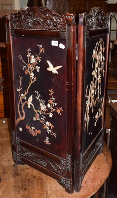 Lot 1286 - A Japanese Meiji period ivory inlaid two-fold screen, decorated with birds amongst boughs, each...