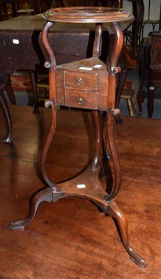 Lot 1290 - An early 19th century mahogany wig stand on tripod base