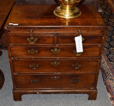 Lot 1291 - A 19th century mahogany bachelor's chest, with dressing slide above two short over three long...