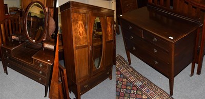 Lot 1308 - A four-piece Edwardian mahogany bedroom suite, comprising a dressing table, wardrobe, chest of...