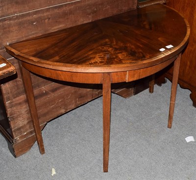 Lot 1314 - A 19th century crossbanded mahogany demi lune table, 110cm by 56cm by 73cm high