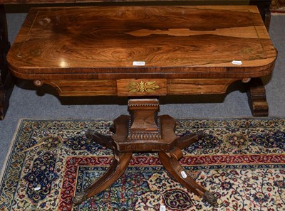 Lot 1325 - A Regency brass inlaid rosewood fold-over card table, 91cm by 45cm by 71cm high