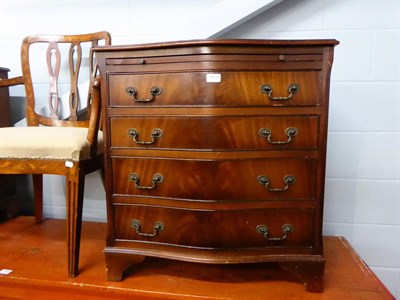 Lot 1331 - A pair of reproduction serpentine fronted bachelor chests