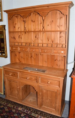 Lot 1333 - A modern pine dresser rack, 136cm by 46cm by 207cm high