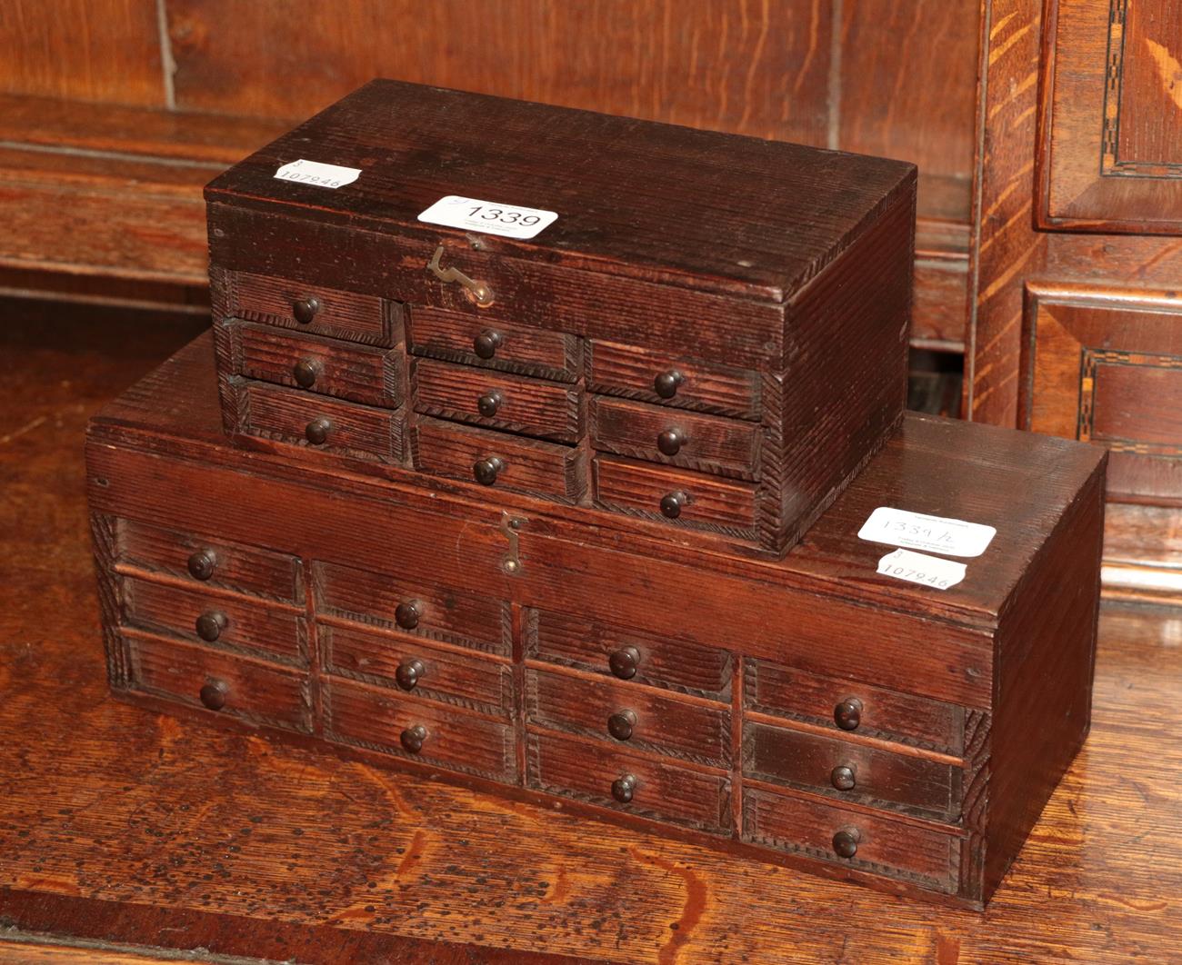 Lot 1339 - A 19th century miniature chest of twelve drawers with hinged cover and another of similar...