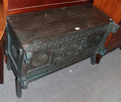 Lot 1346 - A Chinese dowry style chest, carved with horse's head decoration, 100cm by 50cm by 68cm high