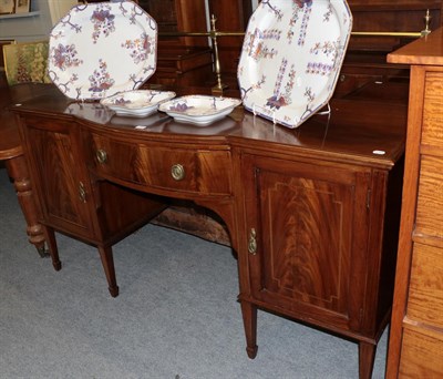 Lot 1351 - An Edwardian bow-fronted inlaid mahogany sideboard, with brass gallery, 181cm by 61cm by 127cm high