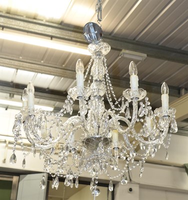 Lot 1352 - A nine-light lustre drop chandelier, 78cm drop