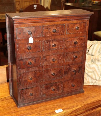 Lot 1358 - A small 19th century table-top cabinet of fifteen drawers made up of cigar boxes