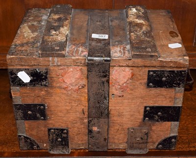 Lot 387 - A 19th century iron bound oak cash box with wax seal remnants and bearing label for London...