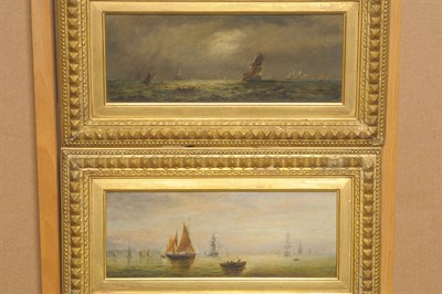 Lot 922 - Attributed to Adolphus Knell (fl.1860-1890) Fishing boats with other shipping under a moonlit...