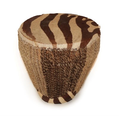 Lot 2224 - Animal Furniture: Plains Zebra Hide Drum Table, circa 1960-1970, of circular form with weaved...