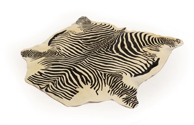 Lot 2255 - Hides/Skins: A Cow Hide Zebra Print Rug, modern,  a high quality cow hide skin rug with Zebra print
