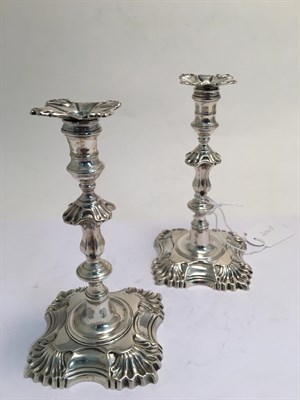 Lot 2005 - A Pair of George II Silver Taper-Candlesticks, by Ebenezer Coker, London, 1764, each on shaped...