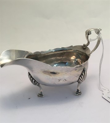 Lot 2024 - A George III Silver Cream-Boat, by John Langlands, Newcastle, Circa 1800, boat-shaped and on...
