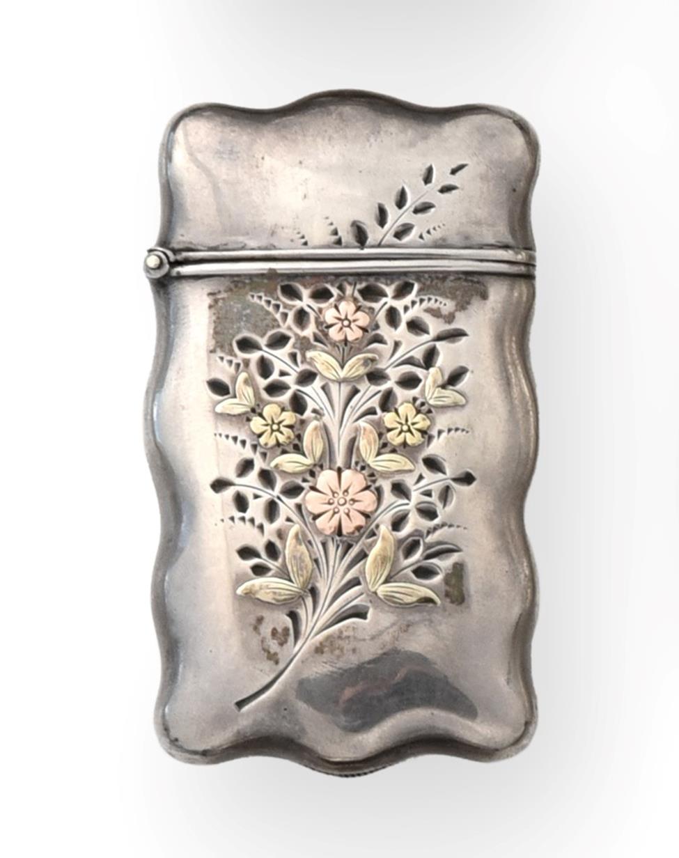 Lot 2088 - An American Silver and Mixed Metal Vesta-Case, Stamped Sterling, Circa 1900, shaped oblong, the...