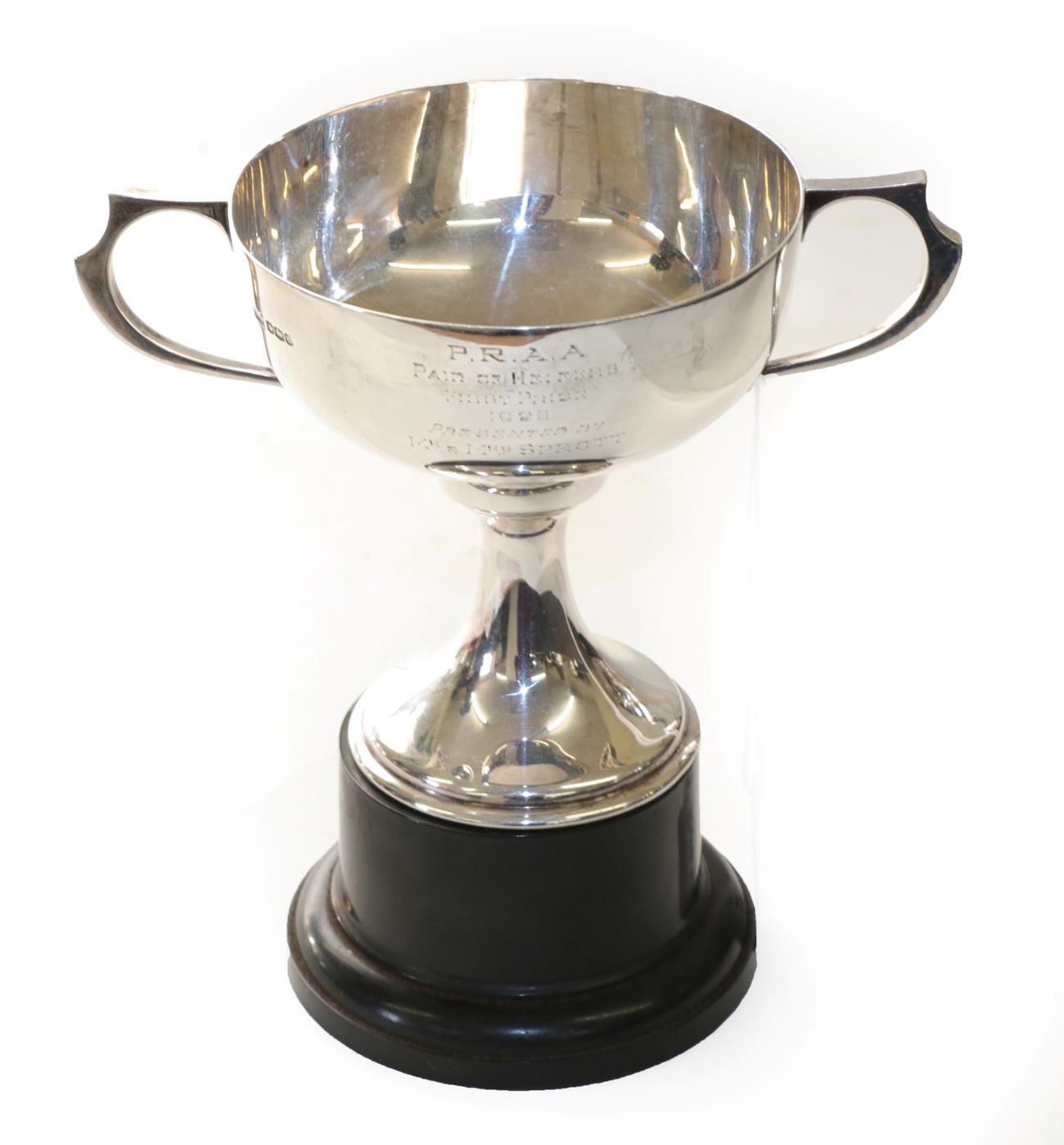 Lot 2118 - A George V Silver Cup, by Henry Atkin, Sheffield, 1925, the bowl circular and on spreading...